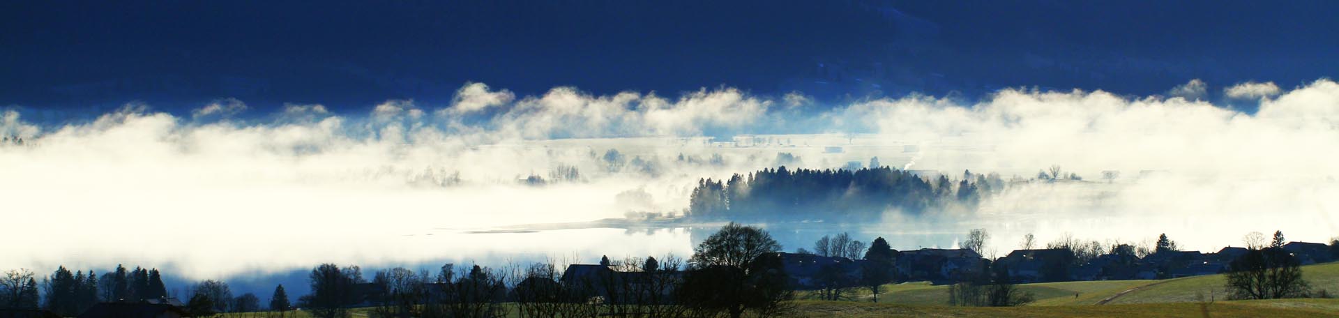 Der Forggensee im Nebel